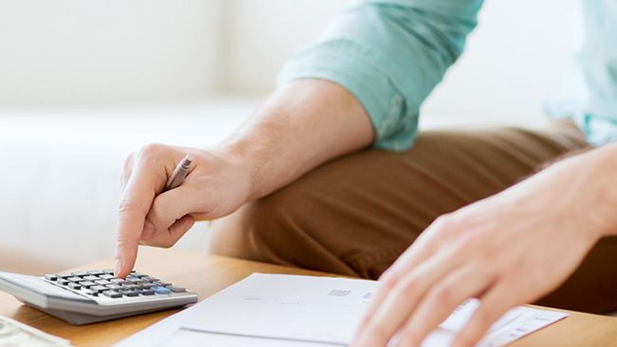 Person paying utility bill.