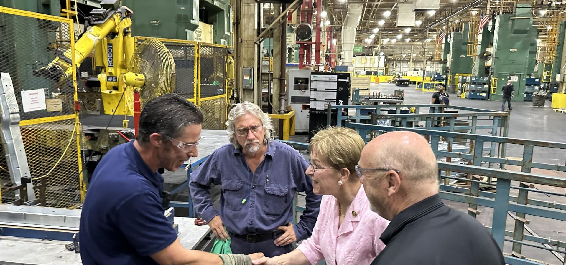 Congresswoman Kaptur meeting with employees in a manufacturing facility 